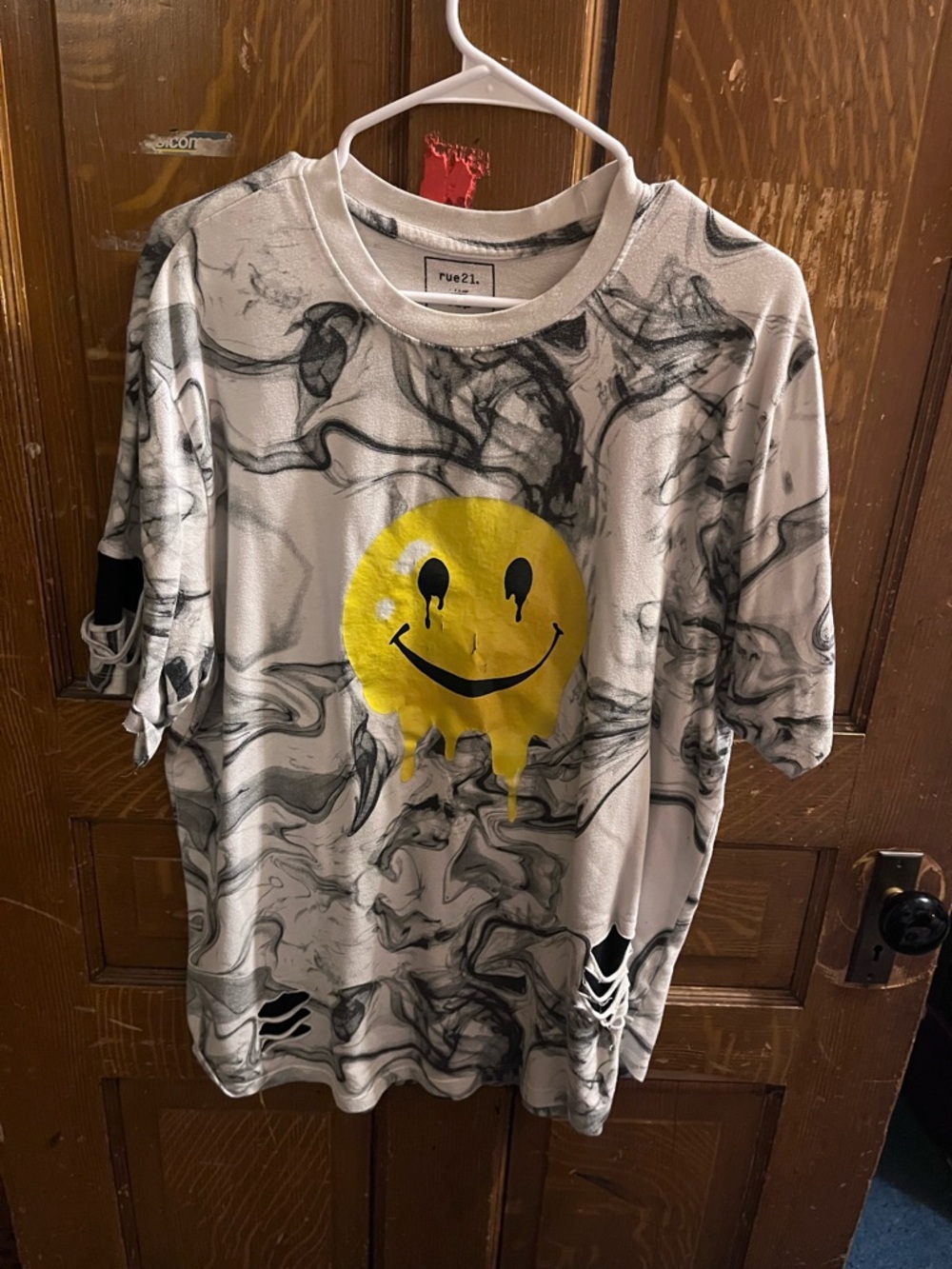Rue21 White Marble Tee with Yellow Drip Smiley Graphic